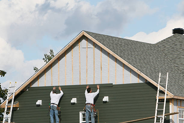 Professional Emergency Siding Repair technician working in Woodleaf, NC